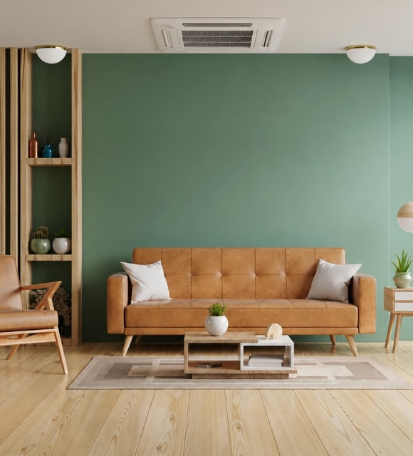 Radiateur mural dans un salon chauffé par une chaudière installée en Vendée