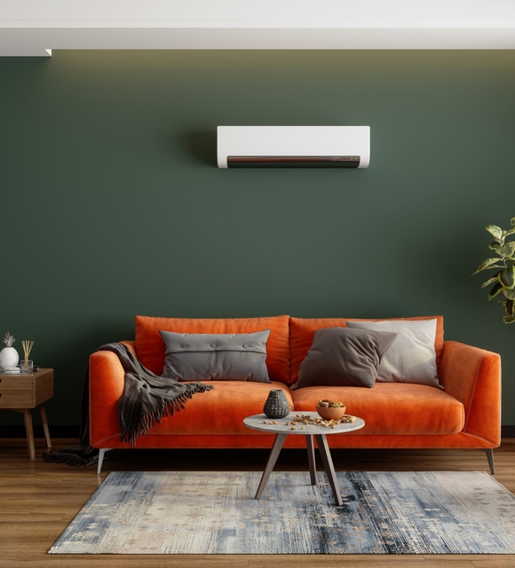 Radiateur mural dans un salon chauffé par une chaudière installée en Vendée