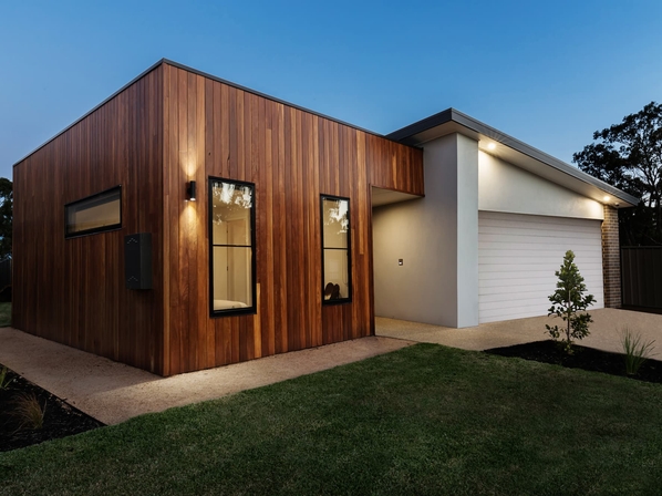 Maison avec une extension en bois