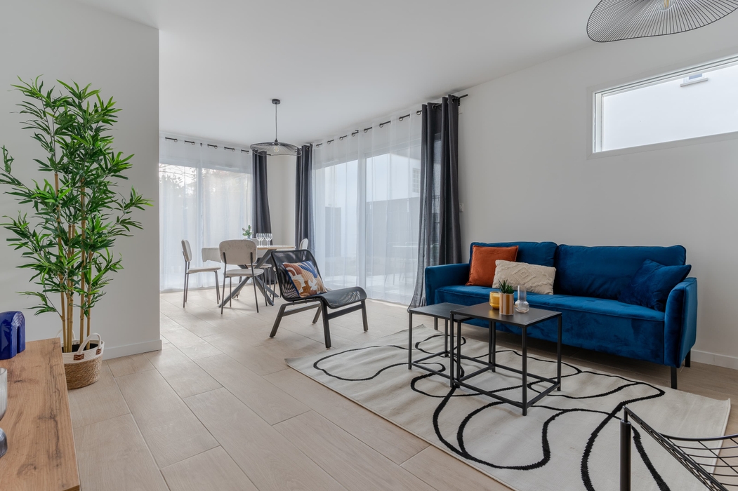 Home staging Orvault Pièce de vie aménagée après home staging dans maison témoin pour promoteur immobilier